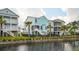 Picturesque two-story beach house with a screened porch, offering stunning views and a tranquil coastal lifestyle at 2313 Bucktail Ct, Mount Pleasant, SC 29466