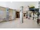 Large garage with a speckled floor, block support beams, and ample ceiling storage racks at 2313 Bucktail Ct, Mount Pleasant, SC 29466