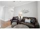 Inviting living room features comfortable seating, a stylish rug, and tasteful decor at 2313 Bucktail Ct, Mount Pleasant, SC 29466