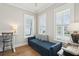 Cozy office space with daybed, desk, natural light from three large windows at 2313 Bucktail Ct, Mount Pleasant, SC 29466