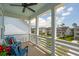 Enjoy outdoor living on this charming porch with comfortable seating overlooking scenic views at 2313 Bucktail Ct, Mount Pleasant, SC 29466