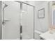 Walk-in shower with glass enclosure, white subway tile, and framed map art at 2313 Bucktail Ct, Mount Pleasant, SC 29466