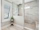 Sleek walk-in shower with gray tiling, glass partition, and a modern design at 2313 Bucktail Ct, Mount Pleasant, SC 29466