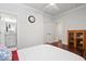 Bright bedroom featuring a ceiling fan, ensuite bathroom, and hardwood floors at 2331 Brinkley Rd, Johns Island, SC 29455