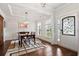 Elegant dining room with hardwood floors, stylish furnishings, and natural light at 2331 Brinkley Rd, Johns Island, SC 29455
