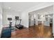 Bright exercise area with hardwood floors leading into a modern kitchen at 2331 Brinkley Rd, Johns Island, SC 29455