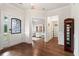 Elegant foyer featuring hardwood floors, and an office with lots of natural light at 2331 Brinkley Rd, Johns Island, SC 29455