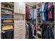 Custom walk-in closet with built-in storage, shelving, and drawers at 2331 Brinkley Rd, Johns Island, SC 29455