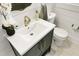 Charming bathroom with modern fixtures, shiplap walls, and a decorative mirror at 2456 Lantern St, Charleston, SC 29414