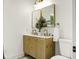 Stylish bathroom with a dual sink vanity, gold fixtures, and a neutral color scheme at 2456 Lantern St, Charleston, SC 29414
