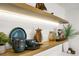 Stylish kitchen features open shelving adorned with decorative dishware and complementing wooden accents at 2456 Lantern St, Charleston, SC 29414