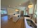 Spacious, updated kitchen with an island, stainless steel appliances, and modern lighting at 2456 Lantern St, Charleston, SC 29414