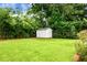 Backyard featuring a storage shed, and mature shade trees at 2456 Lantern St, Charleston, SC 29414