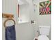 Clean, bright bathroom with white bead board, towel ring, and modern toilet at 2494 Cape Rd, Johns Island, SC 29455