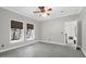 Bedroom featuring carpet, two windows and a ceiling fan at 2494 Cape Rd, Johns Island, SC 29455
