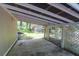 Wide-angle shot showing a open air carport with metal awning at 2494 Cape Rd, Johns Island, SC 29455