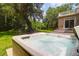 Inviting hot tub with landscaped backyard views, perfect for relaxation and outdoor enjoyment at 2494 Cape Rd, Johns Island, SC 29455