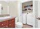 Bathroom with laundry area including washer and dryer, offering convenience and functionality for daily chores at 2494 Cape Rd, Johns Island, SC 29455