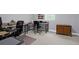 Office space with multiple desk setups and storage, ideal for working from home in a productive environment at 2494 Cape Rd, Johns Island, SC 29455