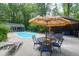 Relaxing pool area includes a cabana and seating, perfect for entertaining and enjoying the outdoors at 2494 Cape Rd, Johns Island, SC 29455