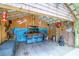 Fun, brightly decorated poolside bar featuring a large screen tv, seating, and plenty of room for entertaining at 2494 Cape Rd, Johns Island, SC 29455