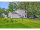 Large backyard with lush green grass and a privacy fence, providing a secure space for outdoor enjoyment at 2538 Wayne Scott Ct, Charleston, SC 29414