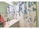 Bathroom features a shower and tub combination with sink and a lovely decorative curtain at 2538 Wayne Scott Ct, Charleston, SC 29414