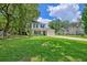 Charming two-story home with a well-manicured lawn and a driveway leading to an attached garage at 2538 Wayne Scott Ct, Charleston, SC 29414
