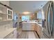 Bright kitchen featuring stainless steel appliances, wood floors, and marble countertops at 2538 Wayne Scott Ct, Charleston, SC 29414