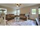 Comfortable living room with plush seating, a stylish rug, and a ceiling fan for added comfort at 2538 Wayne Scott Ct, Charleston, SC 29414