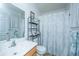 Well-lit bathroom with a vanity, mirror, and a shower curtain for a clean and functional space at 2601 Riverridge Ct # A, Moncks Corner, SC 29461