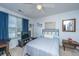 Cozy bedroom with neutral carpet, a ceiling fan, a window with curtains and a full bed set at 2601 Riverridge Ct # A, Moncks Corner, SC 29461