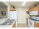 Functional kitchen with white appliances, cabinets, and laminate countertops at 2601 Riverridge Ct # A, Moncks Corner, SC 29461