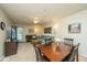 Spacious living room with a dining area and a view of the backyard at 2601 Riverridge Ct # A, Moncks Corner, SC 29461