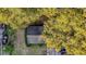 Aerial view of house surrounded by mature trees and lush greenery at 2736 Star Drive, North Charleston, SC 29406