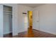 Bedroom includes closet, coat hooks, hardwood floors, and neutral paint at 2736 Star Drive, North Charleston, SC 29406