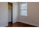 Bedroom featuring hardwood floors, closet and a large window at 2736 Star Drive, North Charleston, SC 29406