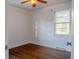 Bedroom with a large window, hardwood floors, and fresh paint at 2736 Star Drive, North Charleston, SC 29406