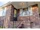 Close-up of the front porch with brick steps, black iron railings, and the house number above the front door at 2736 Star Drive, North Charleston, SC 29406