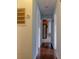 Hallway with access to the kitchen and wood flooring at 2736 Star Drive, North Charleston, SC 29406