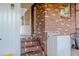 Exterior of home includes entrance to patio and washer at 2736 Star Drive, North Charleston, SC 29406