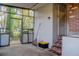 Enclosed patio features outdoor storage, laundry area, and natural light at 2736 Star Drive, North Charleston, SC 29406