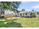 Spacious backyard featuring a fire pit area and well-maintained lawn at 2949 Alabama Dr, North Charleston, SC 29405