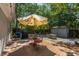 Inviting backyard with outdoor seating, patio, barbecue, shed, and beautiful landscaping, perfect for entertaining guests at 3002 Waterway Blvd, Isle of Palms, SC 29451