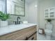 Stylish bathroom features a modern vanity, wood accents and a bright, airy feel at 3002 Waterway Blvd, Isle of Palms, SC 29451