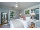 Cozy bedroom with natural light, ceiling fan, and charming decor at 3002 Waterway Blvd, Isle of Palms, SC 29451