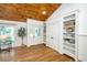 Bright living room with built-in shelves and hardwood floors at 3002 Waterway Blvd, Isle of Palms, SC 29451