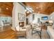 Bright living room featuring a fireplace, wood ceiling, and hardwood floors at 3002 Waterway Blvd, Isle of Palms, SC 29451