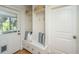 Mudroom features built-in storage, a bench with cushions, and convenient hooks at 3002 Waterway Blvd, Isle of Palms, SC 29451
