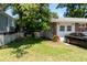 Spacious backyard featuring a well-maintained lawn and mature trees at 320 Morrison Street, Mount Pleasant, SC 29464